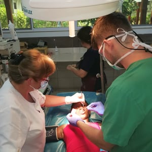 Tooth extraction on a girl with disabilities under general anaesthetics. Also present in the operating theatre: dentist Petra Pellio
